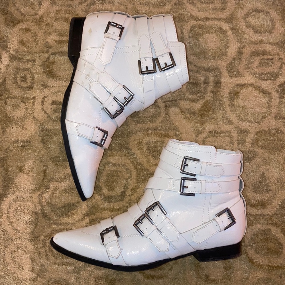 White leather buckled ankle boots